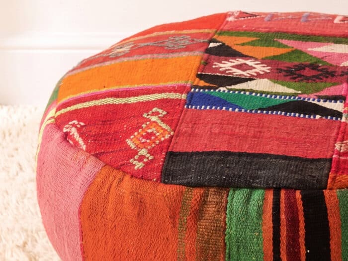 Close-up of Bohemian Floor Pouf showing triangular kilim patches with woven diamond and star motifs