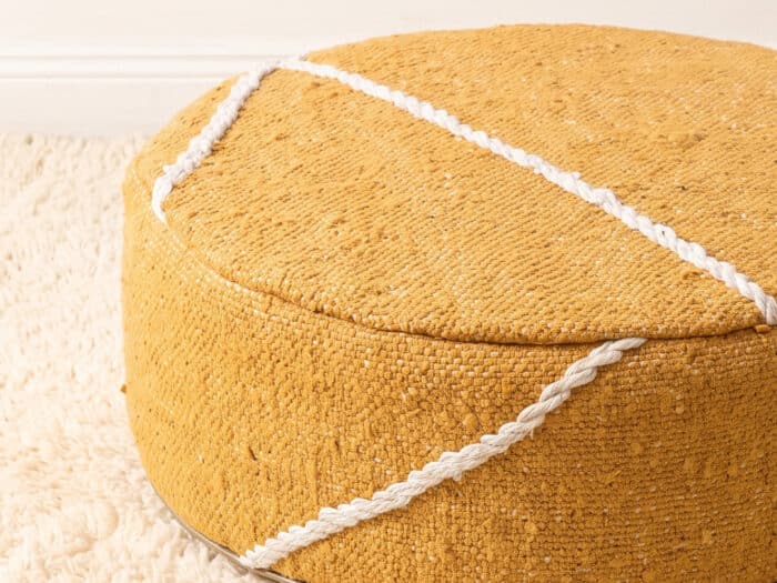 Morocco Yellow Ottoman close-up showing golden yellow flatweave and white Berber cord lines
