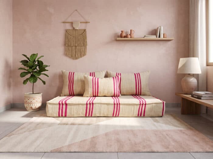 Fuchsia and cream floor couch front view, handwoven flatweave seat and lumbar pillow by Asala Living